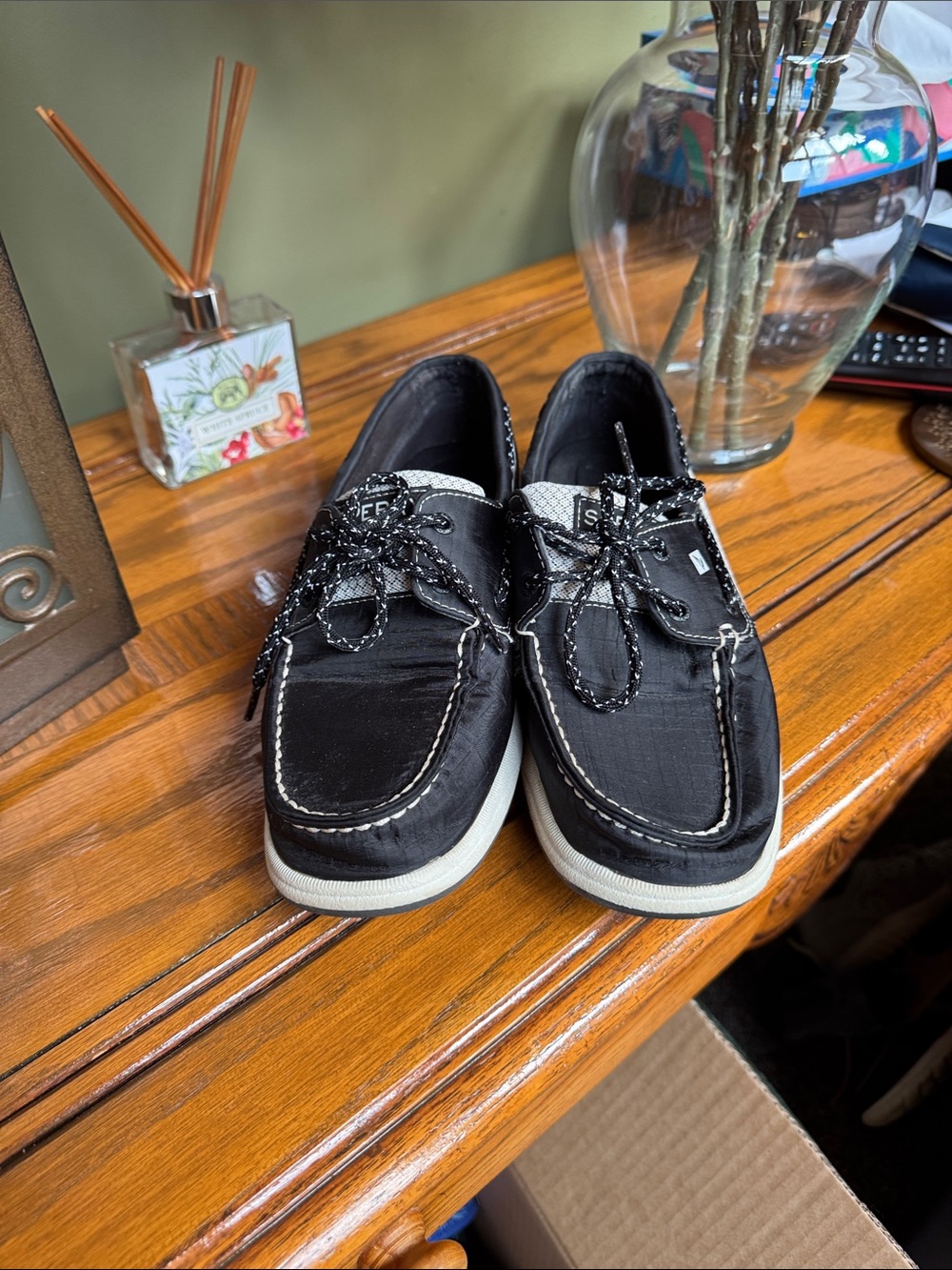 Sperry Black Canvas Boat Shoes with White Soles